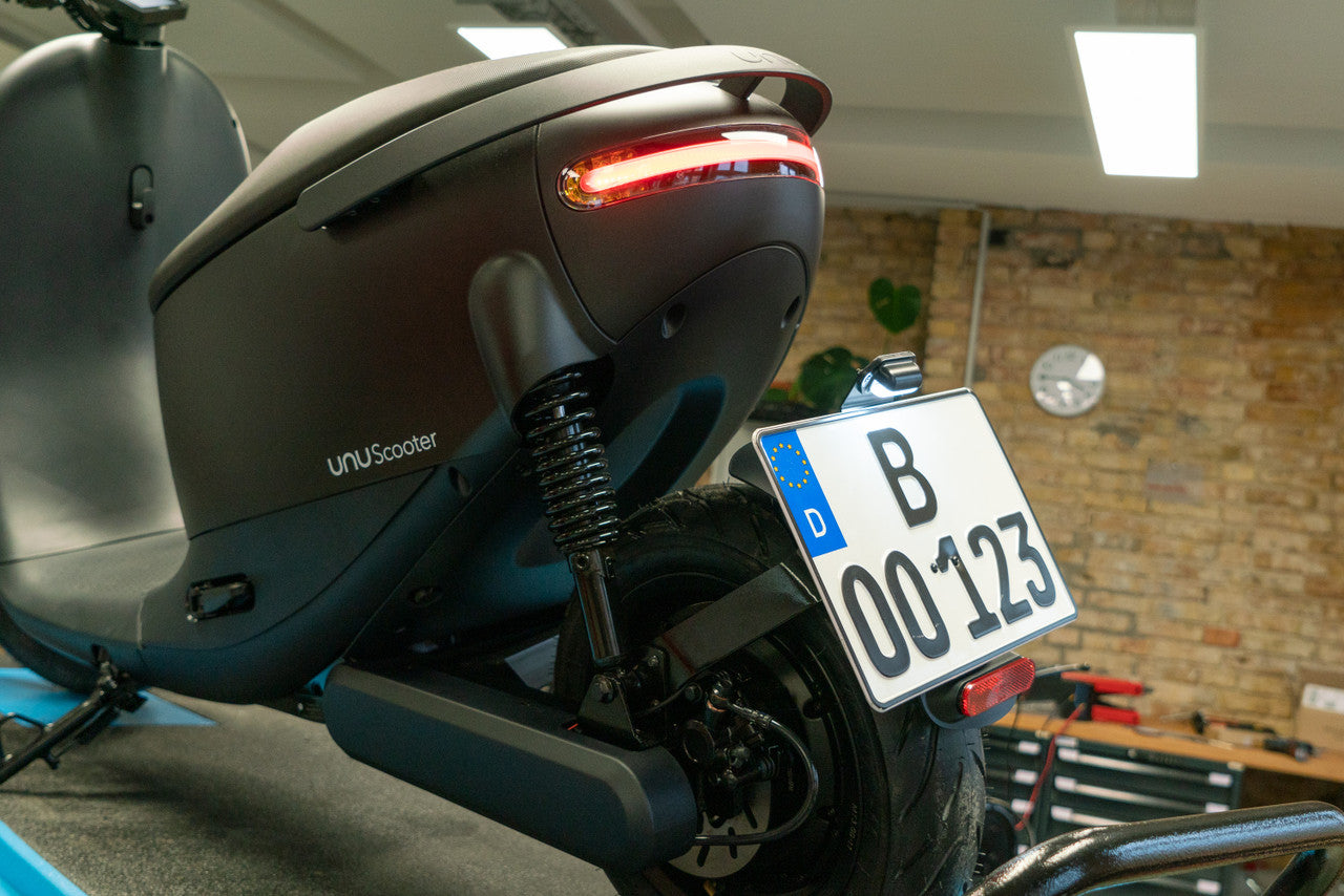 Portamatrículas grande <tc>UNU</tc>